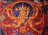 Tibet Guge 09 Tsaparang Demchog Temple 05 Ratnasambhava Along the back wall is the cycle of Akshobhya (Guhyasamaja), the five Tathagatas each with three heads and six arms, garbed in rich bodhisattva ornaments and crowns. On the far left of the wall is my favourite, a beautiful Ratnasambhava, painted in Kashmiri style with the faces and bodies elongated, the waists are very narrow, and the abdomens slightly bulging. They have well-developed, almost breast-like pectoral muscles, although their multiple arms are thin and spidery. Photo - Weyer/Aschoff: Tsaparang, Tibets Grosses Geheimnis,